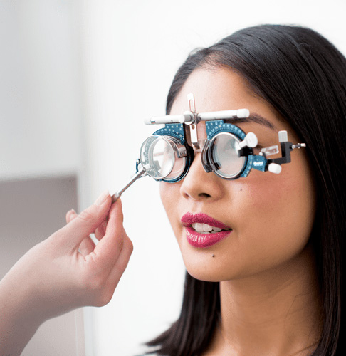 Young woman having eye exam