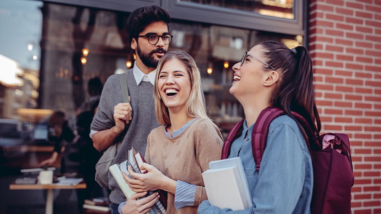students outside a cafe
