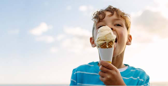 boy licking ice cream