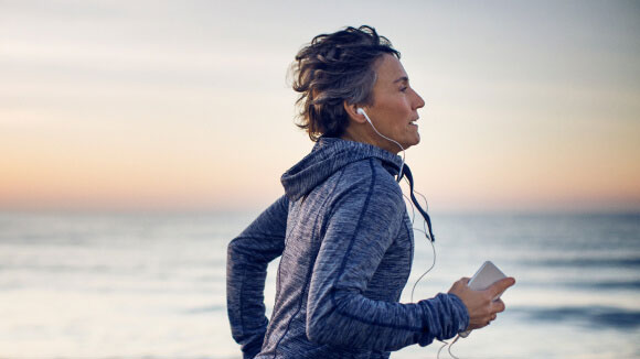 Woman running on beach
