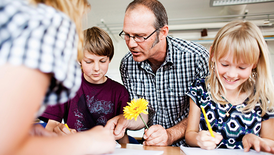 Father guiding children with insights