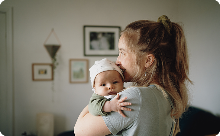 Mother holding newborn baby