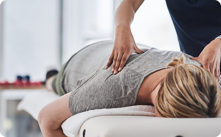 Woman receiving banc massage