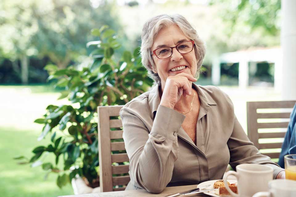 Lady sitting at outdoor setting