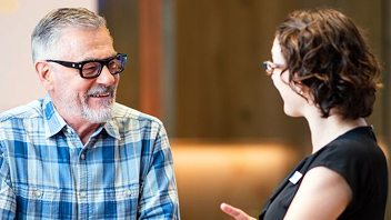 Two people having a conversation.